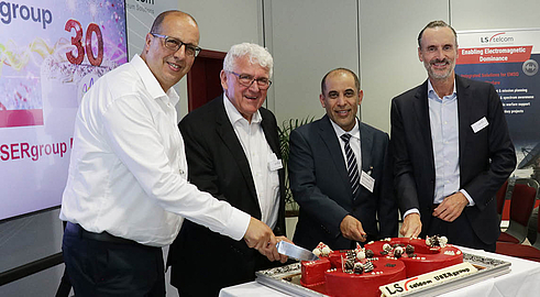 USERgroup LS telcom 2026 cake USERgroup LS telcom board and chairman cutting the cake