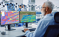 Radio Planning for Private Networks Engineer reviews coverage and radio planning maps for reliable 5G and private network design